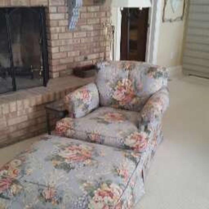 Floral upholstered chair and ottoman