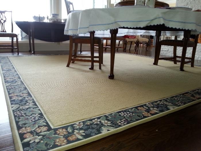Stark rug, neutral color with floral border