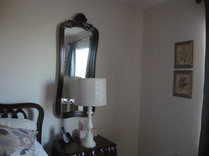 2 mirrors are part of the dresser