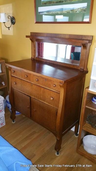 Oak Arts & Crafts sideboard with mirror back.