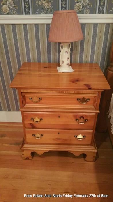One of two pine nightstands