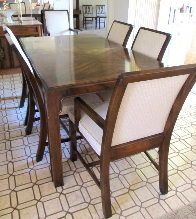 Elegant Parsons Style Dining Set...includes Dining Table with dark finish and two extra leaves... plus table pads, 6 Dining Chairs...2 arm chairs, 4 side chairs, with beige upholstered backs and seats