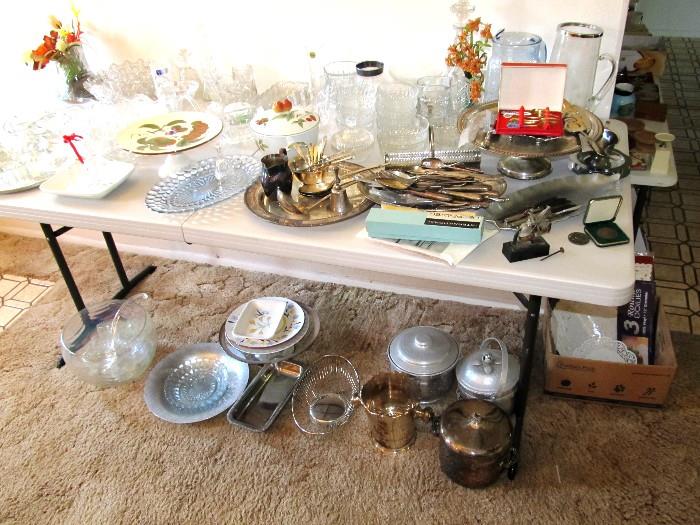 Some of the Collection of crystal, cut glass, pressed glass available in this sale;  Also shown are some of the collection of  silverplate items available in this sale.