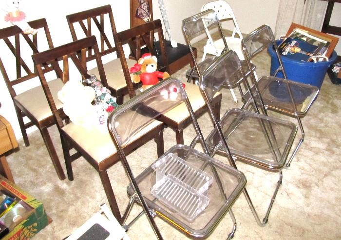 Sets of Folding Chairs Available in this sale...including Set of 4 wood framed folding chairs with neutral colored upholstered seats;  Set of 4 Clear Plastic Folding Chairs;