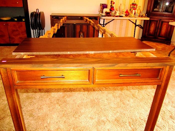 Vintage Saginaw Telescoping / Convertible Banquet /   Buffet Sideboard Table  ... Expand -O -Matic, mfg. by Saginaw Furniture Co.; rich finish,  low profile in stowed position... expands to banquet sized table capable of seating your family... and then some (perhaps capable of  seating up to 12).