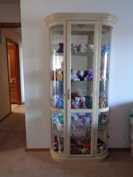 curio filled with beanie babies