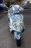 2006 WUSSI Coyote MIX 150cc Scooter (less than 3k Miles): Custom made from Baron Motorcycles for the Puerto-Rico Market, imported to US with limited Silver-Camouflage Fairing, CD-Player & Toolkit (not running due to sitting all winter, will jump start but not turn over & run).  We are also selling a Motorcycle Ramp which might help aide in loading this onto your vehicle…