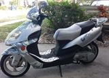 2006 WUSSI Coyote MIX 150cc Scooter (less than 3k Miles): Custom made from Baron Motorcycles for the Puerto-Rico Market, imported to US with limited Silver-Camouflage Fairing, CD-Player & Toolkit (not running due to sitting all winter, will jump start but not turn over & run).  We are also selling a Motorcycle Ramp which might help aide in loading this onto your vehicle…