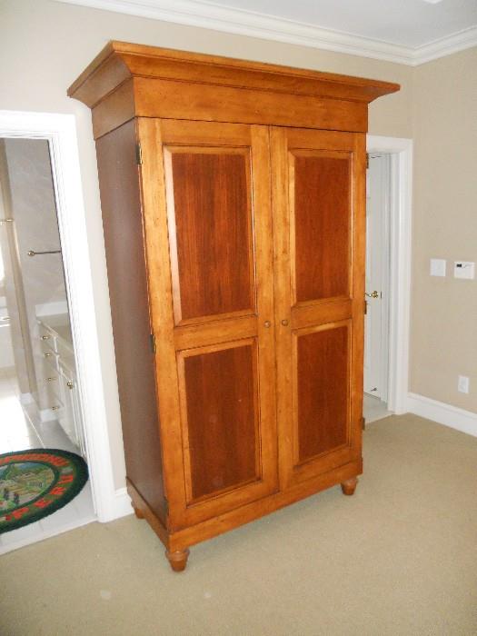 Very attractive two-toned armoire/entertainment center