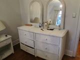 Part of White Wicker Full Sized Bedroom Set.  This picture features the long chest of drawers with dual mirrors.