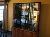 Dining Room Lighted Display Hutch  This hutch features flame mahogany on the door with wood black lacquer framing.  It is a beauty and very high quality compared to the pressboard being sold today.