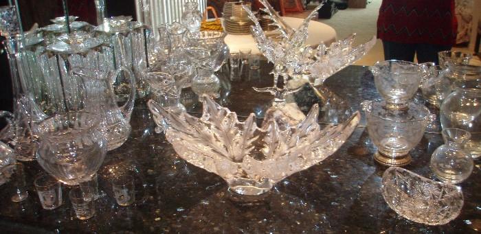 Lalique Champs Elysees  Leaf Bowl Along with Orrefors and other Crystal pieces....Great Eagle sculpture in crystal in the background mounted in stone. 