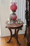 Marble top table with Bird carve legs. vintage table lamp. 
