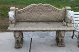 This bench is made of cement, Rams and Lions heads