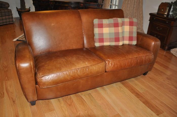 Great caramel colored leather sofa