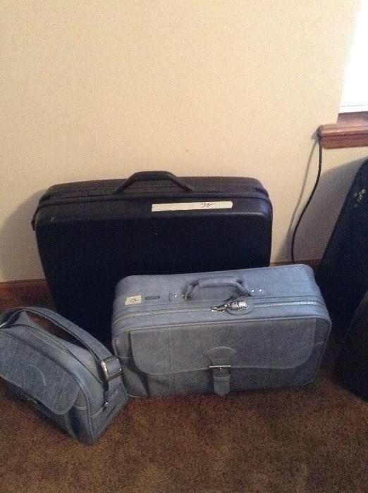 Samsonite suitcases and vinyl set