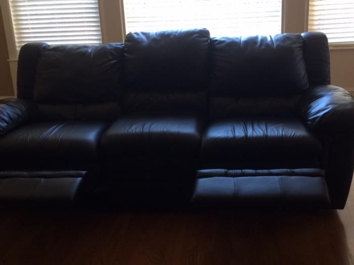 PAIR OF RECLINING BLACK LEATHER SOFAS