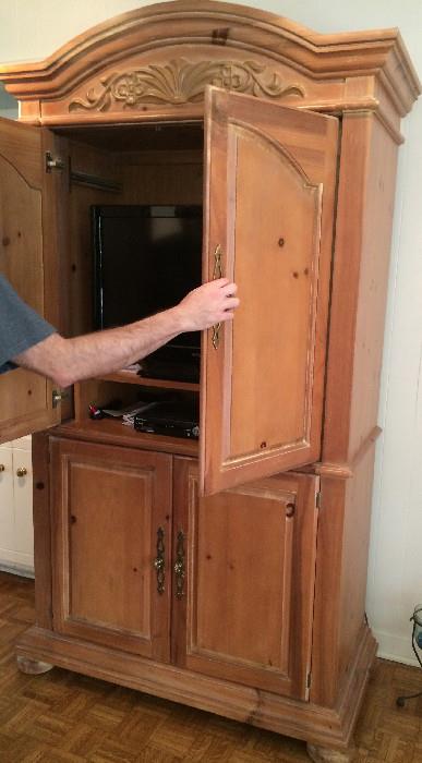 TV Cabinet/Armoire  There are so many people re-purposing these....check Pinterest for ideas!