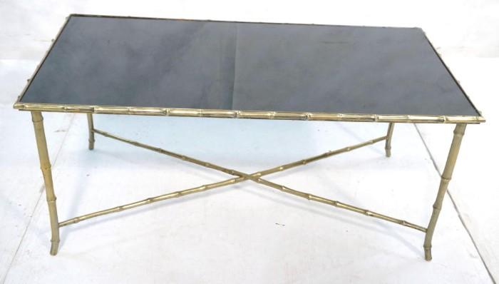 Lot 3:  French Maison Bagues Faux Bamboo Coffee Cocktail Table.  Brass with with Black Glass.  Unsigned Attribution.: Dimensions:  H: 18 inches: W: 40 inches: D: 20.5 inches --- 