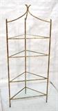 Lot 44:  Faux Bamboo Gilt Metal Corner Shelf Etagere. Decorator style.  4 Glass Shelves. Maison Bagues Style.: Dimensions:  H: 70 inches: W: 28.5 inches: D: 20.5 inches --- 