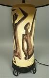 Lot 80:  FANTONI Italian Pottery Table Lamp. Yellow column with figural design. Black Metal Base. Signed on pottery. Pottery is 13"H. : Dimensions:  H: 27.5 inches: W: 14.5 inches: D: 14.5 inches --- 