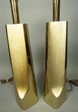 Lot 84:  Pr LAUREL Brass Tone Brutalist Table Lamps. Both marked with paper label. : Dimensions:  H: 34.5 inches: W: 5 inches: D: 5 inches --- 