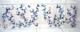 Lot 105:  6pc Mounted butterfly displays in lucite cases, signed Pungton ????. Iridescent blue butterflies mounted in clear acrylic cases boxes.  Two sets of three.: Dimensions:  H: 48 inches: W: 24 inches: D: 3 inches --- 