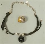 Lot 362:  2pc Modernist Jewelry Lot. 1. Sterling & Black Coral Necklace Collar with seed pendant. 2. Mexican Brass & Sterling World Globe Pendant, marked; pendant is musical & rings.: Dimensions:   --- US Shipping charge: $9