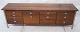 Lot 383:  FINN JUHL Rosewood Danish Credenza Sideboard Cabinet. Aluminum Bow Tie Pulls. Aluminum legs with inlaid rosewood. : Dimensions:  H: 25 inches: W: 77.5 inches: D: 19.5 inches --- 