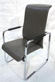 Lot 391:  PETER PROTZMAN for HERMAN MILLER Lounge Chair. High back gray vinyl Lounge Chair. Tubular seating collection: Dimensions:  H: 42 inches: W: 23 inches: D: 27 inches --- 