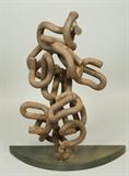 Lot 424:  JOSEPH SELTZER Industrial Iron Sculpture. "Continuing Circles"  Welded sculpture created from found railroad tie downs. Heavy rust patina. Circa 1985. Signed: Dimensions:  H: 21 inches: W: 17 inches: D: 10 inches --- 