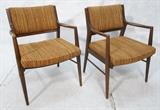 Lot 437:  Pr American Modern Walnut  Arm Lounge Chairs. Shaped arms. Striped gold, orange brown fabric. : Dimensions:  H: 32 inches: W: 23.5 inches: D: 22 inches --- 