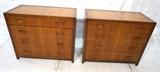 Lot 467:  Pr BAKER Bachelors Chest. American Modern. MICHAEL TAYLOR. Four Drawer Chests with wood pulls. Metal tag: Dimensions:  H: 32 inches: W: 38 inches: D: 19 inches --- 