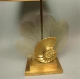 Lot 469:  Brass Nautilus Shell Coral Decorator Table Lamp. Stepped brass base. Clean fabric shade with gold lining. JOHN RICHARD label: Dimensions:  H: 29.5 inches --- 