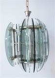 Lot 483:  Modernist VECA Deco style Hanging Pendant Light Lamp. Three arm chandelier with smoked and clear glass fins. Chrome body. : Dimensions:  H: 16 inches: W: 10 inches: D: 10 inches --- 
