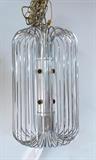 Lot 484:  SCIOLARI 8 Light Chrome Hanging Pendant Light Chandelier. Thin square rod cage around center column with eight light sockets. Made by Lightolier. Not marked: Dimensions:  H: 19.5 inches: W: 12 inches: D: 12 inches --- 