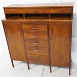 Lot 501:  PAUL McCOBB for LANE Walnut Tall Dresser High Chest. Chromed metal pulls on eight drawers & two doors. Marked: Dimensions:  H: 50 inches: W: 48 inches: D: 18 inches --- 