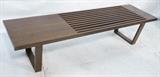 Lot 515:  George Nelson style American Modern Slat Bench Table. Dark wood stain.: Dimensions:  H: 13.75 inches: W: 60 inches: D: 17.5 inches --- 