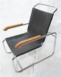 Lot 531:  MARCEL BREUER B35 Lounge Chair. Tubular chromed steel frame.  Black lacquered wood arms. Black leather seat & back. Not marked.: Dimensions:  H: 31.5 inches: W: 24 inches: D: 31.5 inches --- 