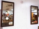 Lot 553:  Pr American Modern Rectangular Wall Mirrors. Ebonized black band trim. : Dimensions:  H: 44 inches: W: 22 inches --- 