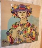 Lot 358:  BJORN WIINBLAD Tapestry Wall Hanging. Portrait of woman with flowered hat holding more flowers. Signed in tapestry. BORKS Atelier mark: Dimensions:  H: 39 inches: W: 39 inches --- 