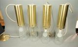 Lot 595:  Set of 4 Gold Tone Aluminum Pendant Lights. Cylindrical metal caps with crackled glass shades. Moe Light.: Dimensions:  H: 20.25 inches: W: 4 inches: D: 4 inches --- 
