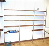 Lot 607:  OMNI Wall Shelf. Four (4)uprights & 14 shelves. : Dimensions:  H: 92 inches: W: 96.5 inches: D: 11 inches --- 