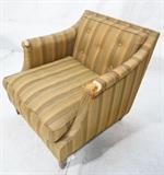 Lot 608:  DUNBAR Arm Lounge Chair. Tapered square wood legs. Striped fabric. Dunbar decking: Dimensions:  H: 28 inches: W: 28 inches: D: 32 inches --- 