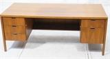 Lot 626:  KNOLL Modern Teak Kneehole Desk. Five drawers. Marked with Knoll international sticker: Dimensions:  H: 29 inches: W: 72 inches: D: 33.5 inches --- 