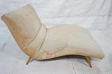 Lot 628:  American Modern Wide Upholstered Chaise Lounge. Adrian Pearsall style. Wave form with tweedy oatmeal fabric upholstery. Tapered peg legs. Not marked: Dimensions:  H: 25 inches: W: 37 inches: D: 60 inches --- 