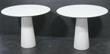 Lot 643:  Pr White Cafe Dining Tables. MOOOI by Mercel Wanders Studio. White cone shaped bases with round white laminate tops. Black edges: Dimensions:  H: 29 inches: W: 35.5 inches: D: 35.5 inches --- 