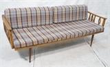 Lot 677:  Modern Plaid Fabric Daybed. Sofa Couch. Open spindle side arms. Long tapered peg legs: Dimensions:  H: 30 inches: W: 77.75 inches: D: 32 inches --- 