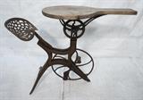 Lot 680:  Industrial Commercial BARNES Velocipede Scroll Saw. Iron seat and stand with wood top. Marked: Dimensions:  H: 39 inches: W: 50 inches: D: 20 inches --- 