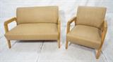 Lot 702:  2pc CONANT BALL Settee & Lounge Chair. Birch frames with rounded corners. Beige vinyl upholstery. : Dimensions:  H: 28.75 inches: W: 45.5 inches: D: 30.5 inches --- 